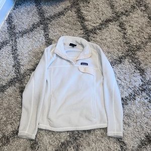 white patagoina button up fleece sweater